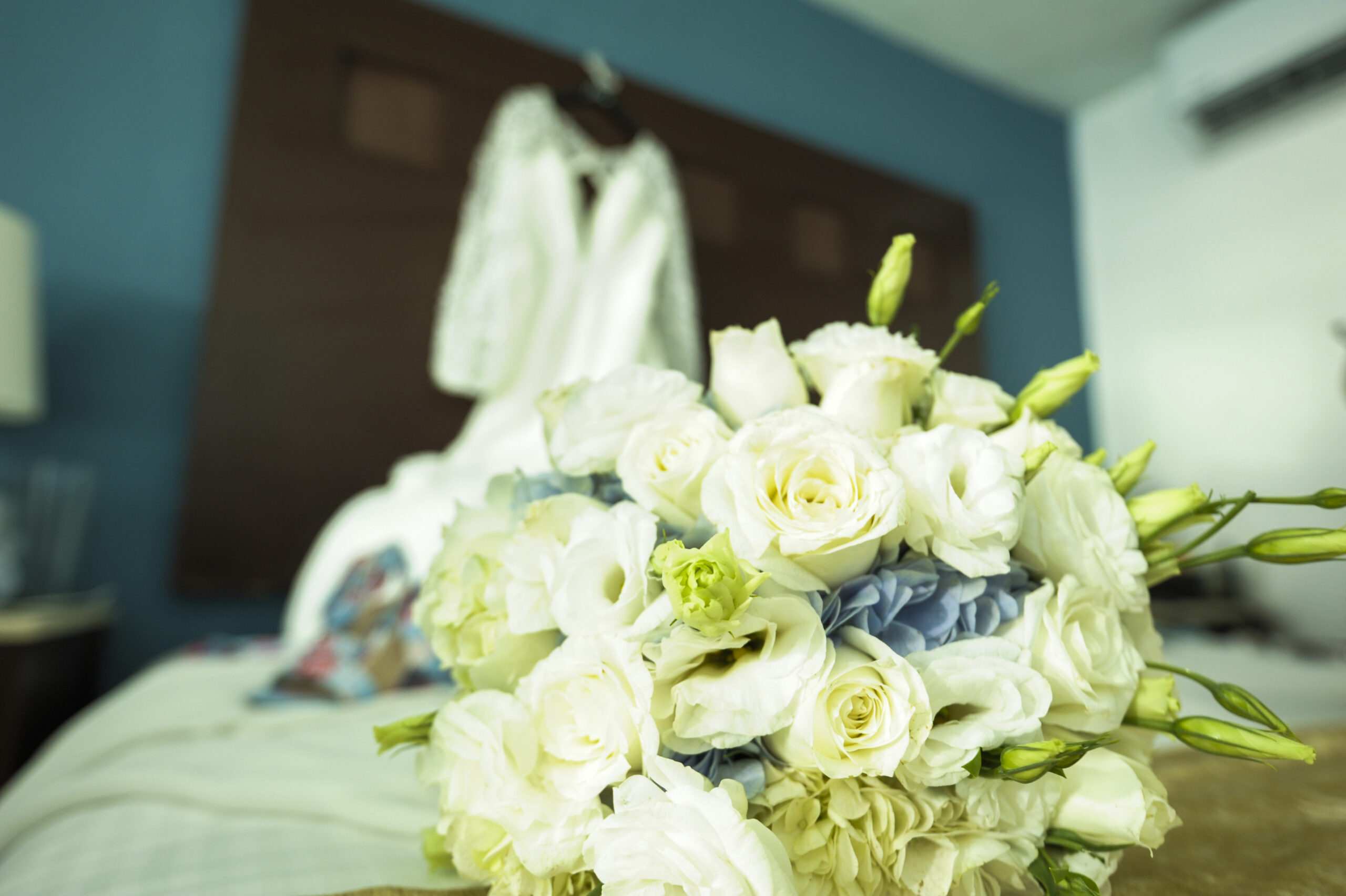 Getting Ready Bouquet Wedding Dress and Bouquet at the room